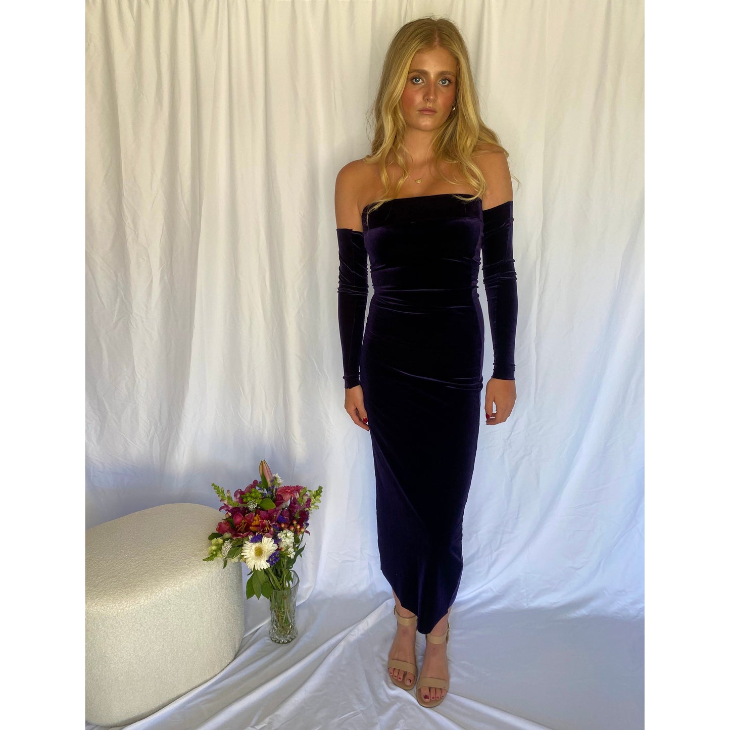 7th and York Strapless Midi Dress in Blackberry, Velvet Material - comes with optional sleeves. Perfect for a variety of formal events. Size 6 dress and Size S sleeves. Front on full length view of dress and sleeves