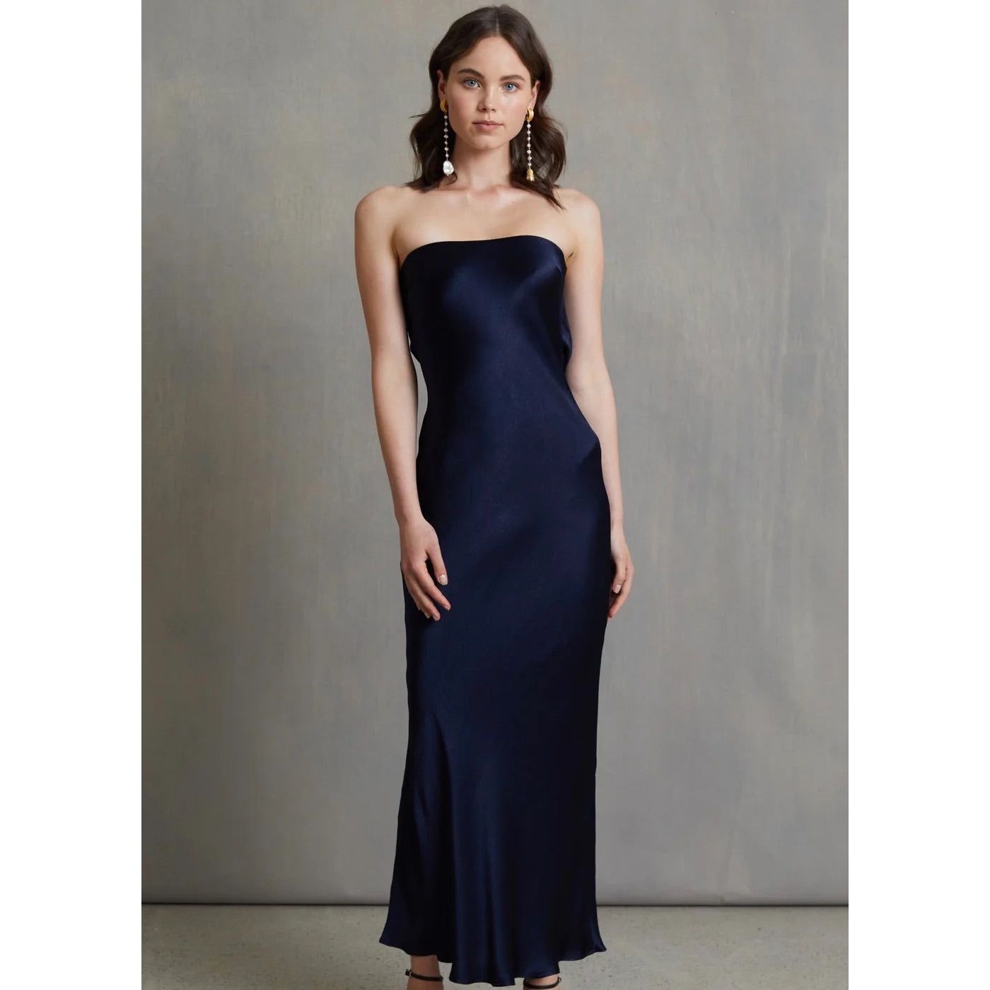 Bec and Bridge Moondance Midi Dress in Navy, Size 14. Perfect for events like formals, 21sts, races etc. Viscose Material with a Silky/Satiny feel slight flow to dress. Front full length view of dress. 