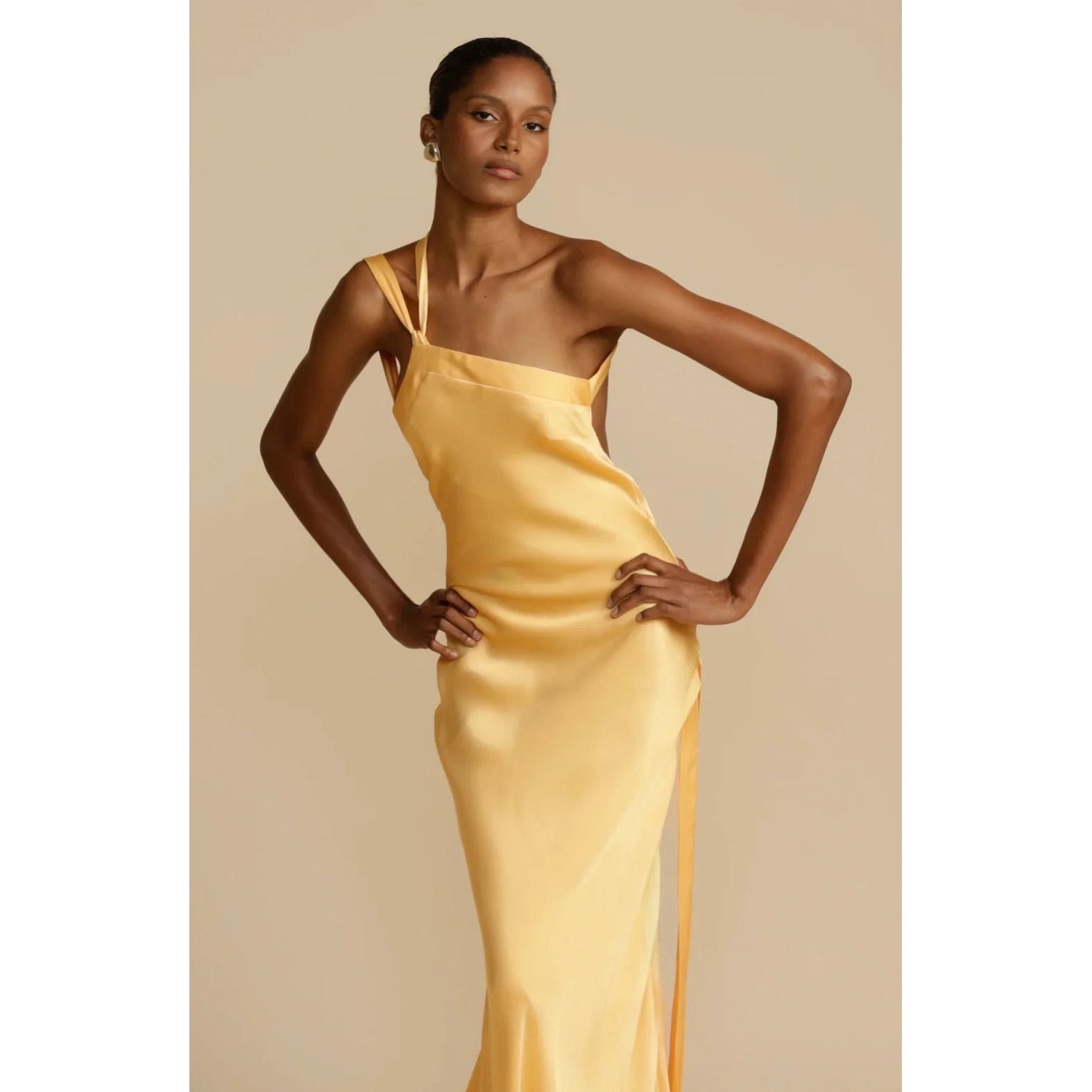 Arcina Ori  Monique Dress in Yellow, Size XS. Open back with tie that goes across back to side of dress. Asymmetrical one shoulder design.  Up close front on view of dress