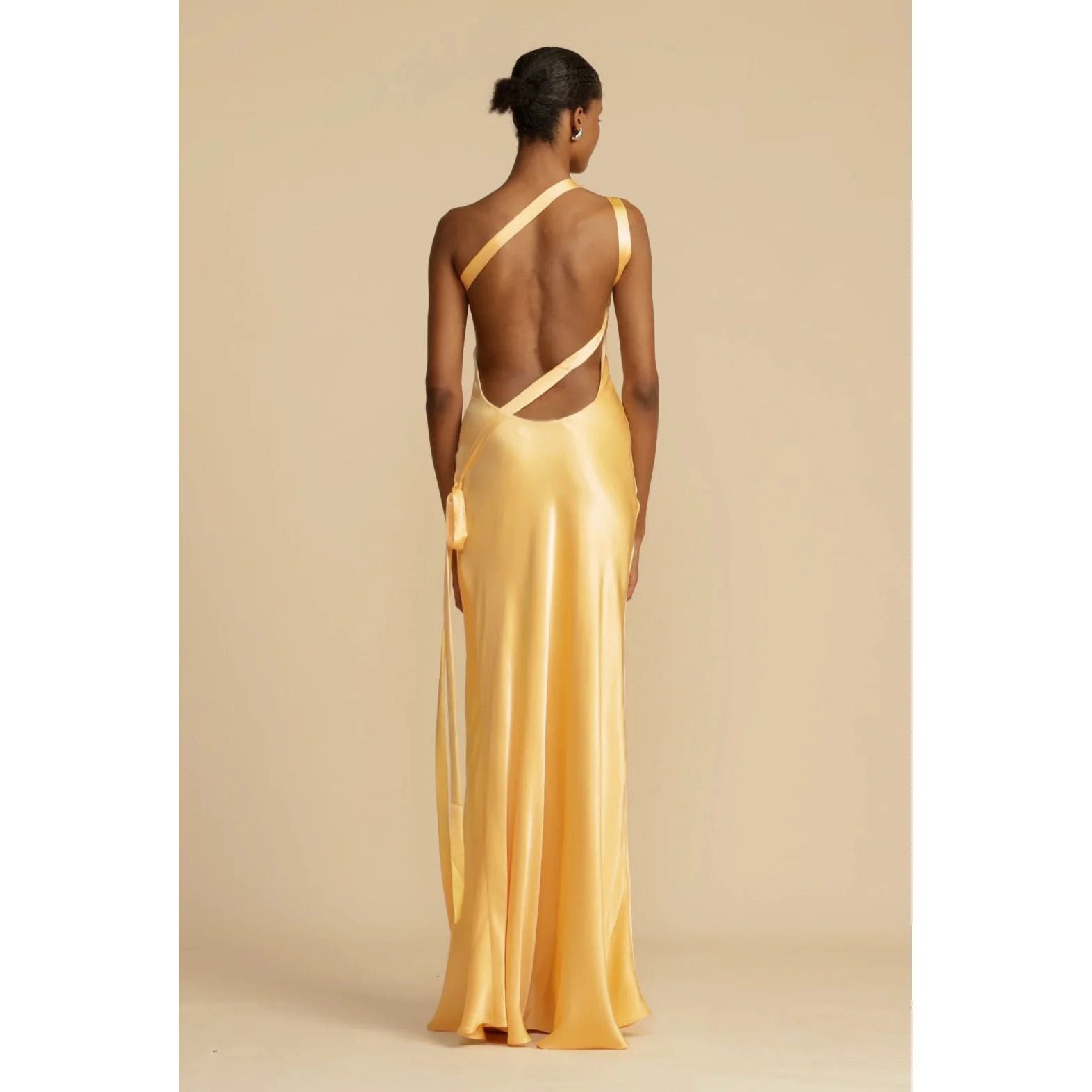 Arcina Ori  Monique Dress in Yellow, Size XS. Open back with tie that goes across back to side of dress. Asymmetrical one shoulder design. Front on view of the back of dress