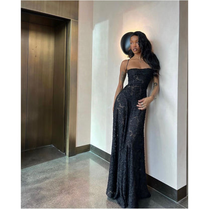 House of CB Seren Maxi Dress in Black, Size XS and L. Perfect for formal events. Lace up back and zip at bottom of lace up.. Semi sheer fabric with a doubled lined bust. Front on full length view of dress