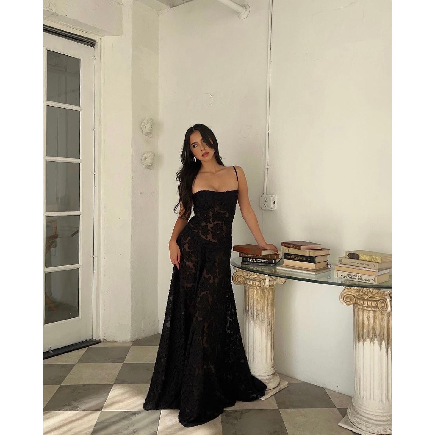 House of CB Seren Maxi Dress in Black, Size XS and L. Perfect for formal events. Lace up back and zip at bottom of lace up.. Semi sheer fabric with a doubled lined bust. Front on full length view of dress