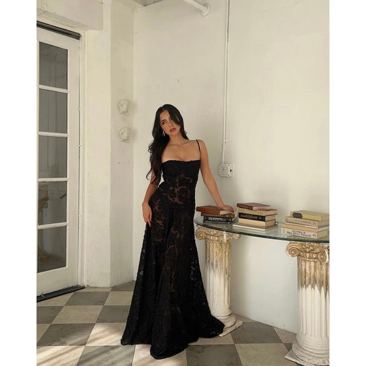 House of CB Seren Maxi Dress in Black, Size XS and L. Perfect for formal events. Lace up back and zip at bottom of lace up.. Semi sheer fabric with a doubled lined bust. Front on full length view of dress