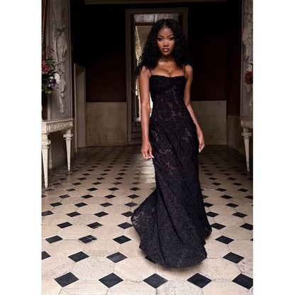 House of CB Seren Maxi Dress in Black, Size XS and L. Perfect for formal events. Lace up back and zip at bottom of lace up.. Semi sheer fabric with a doubled lined bust. Front on full length view of dress moving