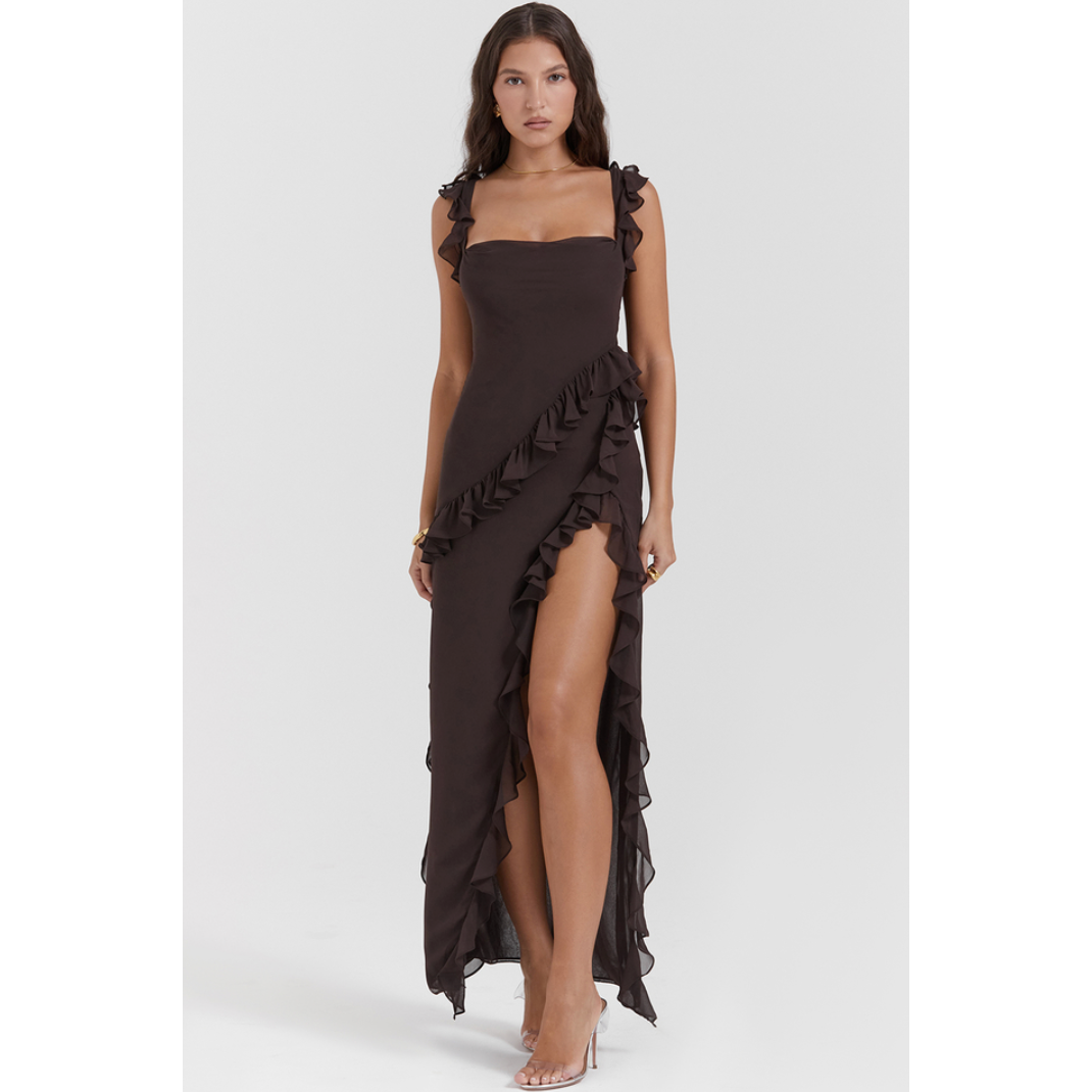 House of CB Ariela Maxi in Brown, Size M. Made of lightweight georgette fabric. Perfect for formal events. Featuring a zip up side and leg slit to mid thigh. Full length front view of dress.