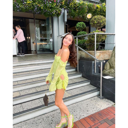 House of CB Babydoll Mini in Lime, Size S and L (Plus Cup). Perfect for the races, wineries, bottomless brunch etc. Zip up back and holes around the hip where the dress can be adjusted slightly length and with of hole wise. Front on side view of dress