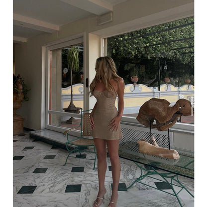 Mirror Palais Fairy Mini, Size 8/S. Tan colour with stunning silver glitter and thin crystal straps that also outline the edges of bust area. Form fitting. Perfect for Birthdays, Bottomless brunches etc. Front side view of dress.