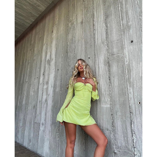 House of CB Babydoll Mini in Lime, Size S and L (Plus Cup). Perfect for the races, wineries, bottomless brunch etc. Zip up back and holes around the hip where the dress can be adjusted slightly length and with of hole wise. Front on view of dress