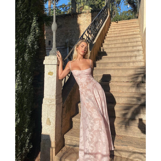 House of CB Seren Maxi Dress in Pink, Size S and M. Perfect for formal events. Lace up back. Semi sheer fabric with a doubled lined bust also comes with optional slip to wear underneath. Front on full length view of dress