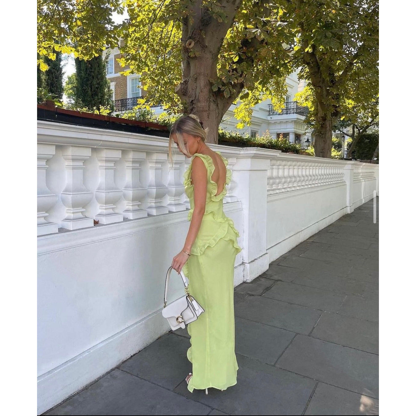 House of CB Pixie Maxi Dress in Green, Size S. Featuring straps with a v cut into the bust and some frill details on the dress. Perfect for formals, races, wineries, bottomless brunch etc. Zip up side. Side full length view of dress