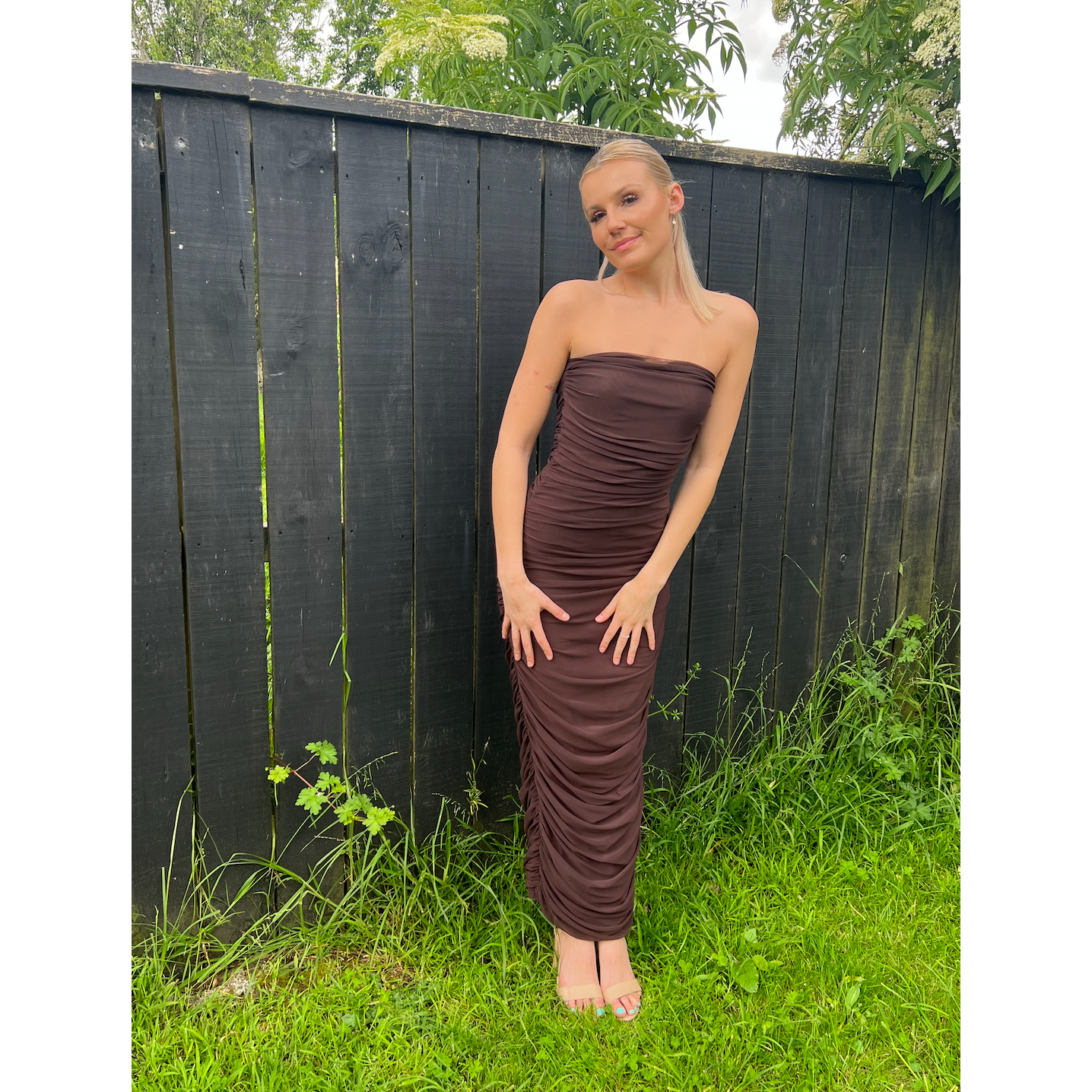 Ruby Ginni Mesh Tube in Chocolate Brown, Size 8. Featuring a strapless design with gathered side seams that create ruching that gently accentuate the contours of your silhouette. Perfect for formals, weddings, races, wineries, birthdays etc. Front on view of dress.