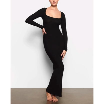 SKIMS Long Sleeve Slip Maxi Dress in Black, Size S. Featuring a Front Square Neckline, Maxi Length, Comfortable, Body-Hugging Fit, Ribbed Fabric Detail. Can be dressed up or down. Front on full length view of dress.